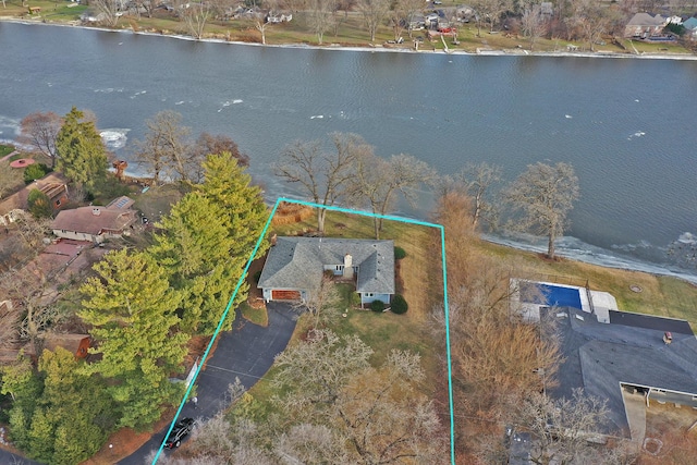 birds eye view of property featuring a water view