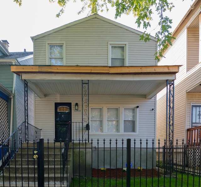 view of front of home featuring covered porch