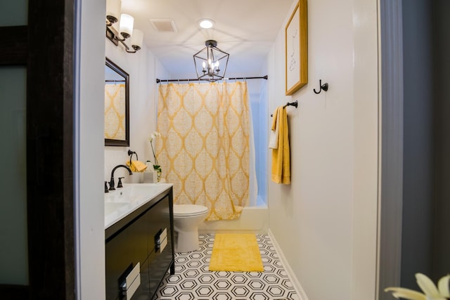 full bathroom with a chandelier, vanity, toilet, and shower / bathtub combination with curtain