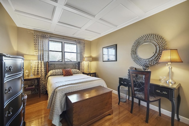 bedroom featuring coffered ceiling, wood finished floors, and baseboards