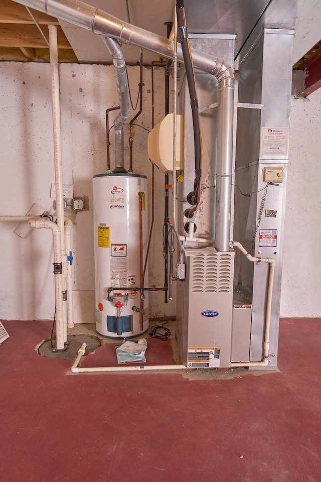 utility room featuring heating unit and water heater