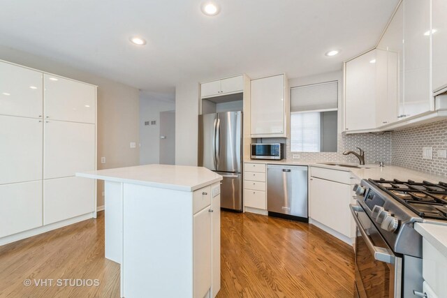 bonus room with lofted ceiling and dark hardwood / wood-style floors