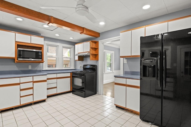 kitchen featuring light tile patterned floors, ceiling fan, black appliances, and white cabinetry