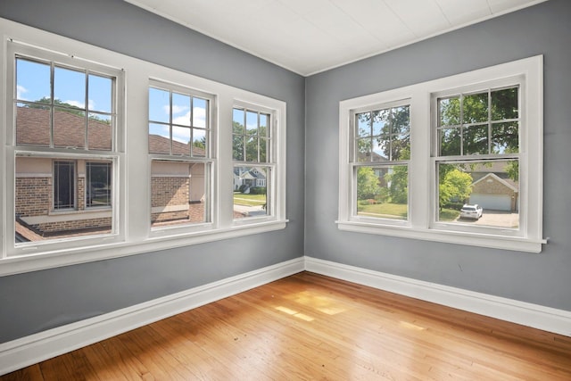 spare room featuring hardwood / wood-style flooring