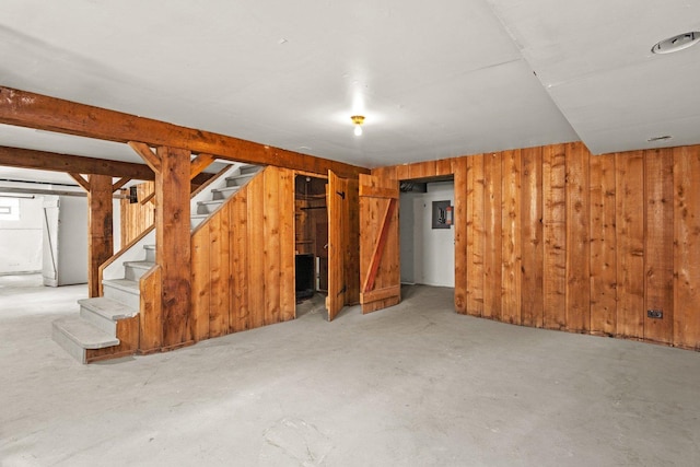 basement with wooden walls