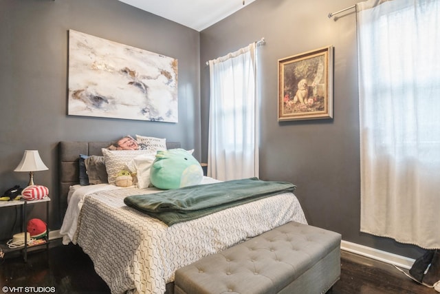 bedroom featuring dark hardwood / wood-style floors