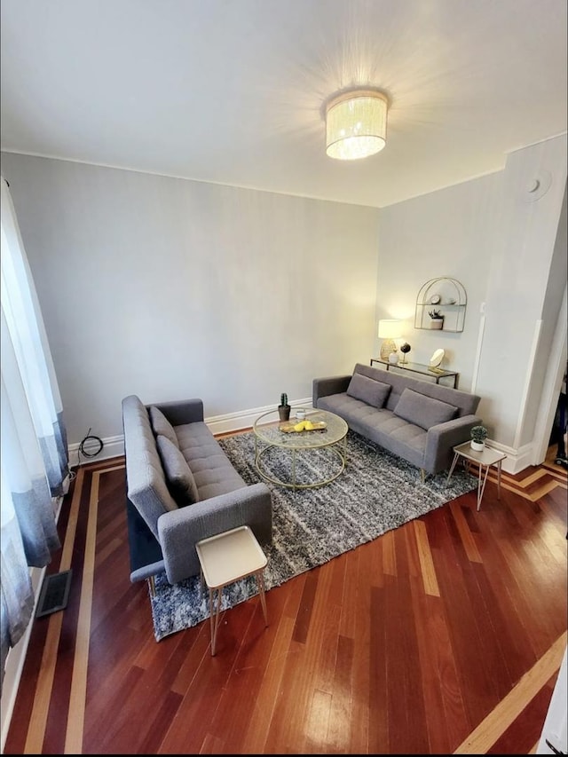 living room featuring dark hardwood / wood-style flooring