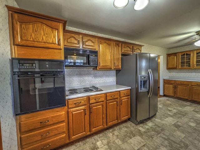 kitchen featuring black appliances and ceiling fan