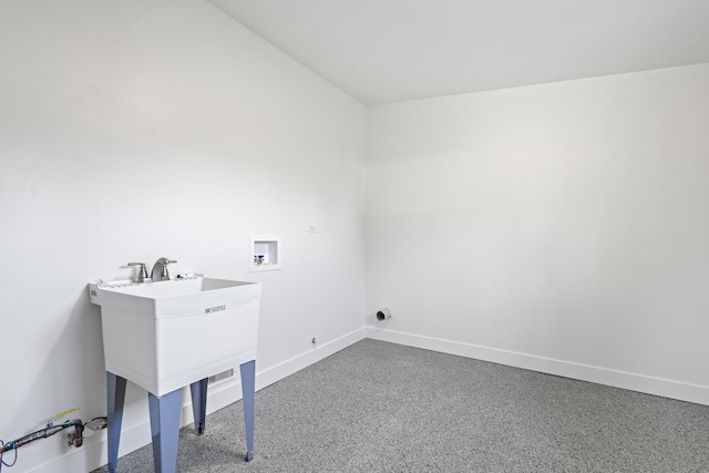 clothes washing area with carpet flooring and washer hookup