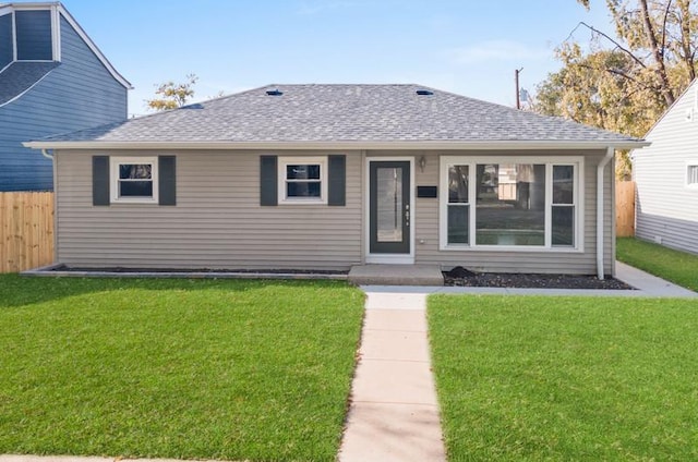 view of front of property with a front lawn