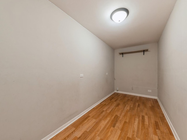 unfurnished room with light wood-type flooring