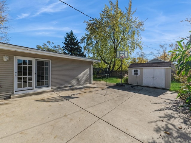 view of patio featuring a shed