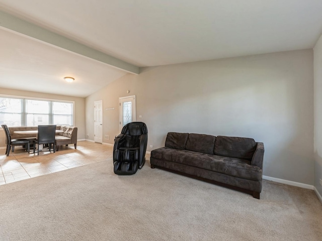 living room with light carpet and lofted ceiling with beams