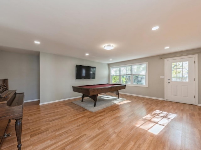 rec room with plenty of natural light, billiards, and light hardwood / wood-style flooring