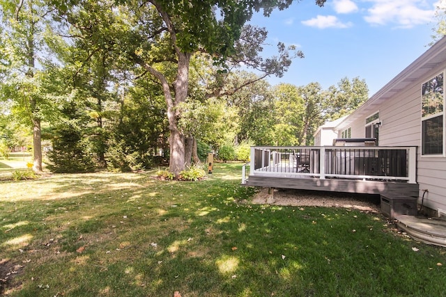 view of yard with a wooden deck