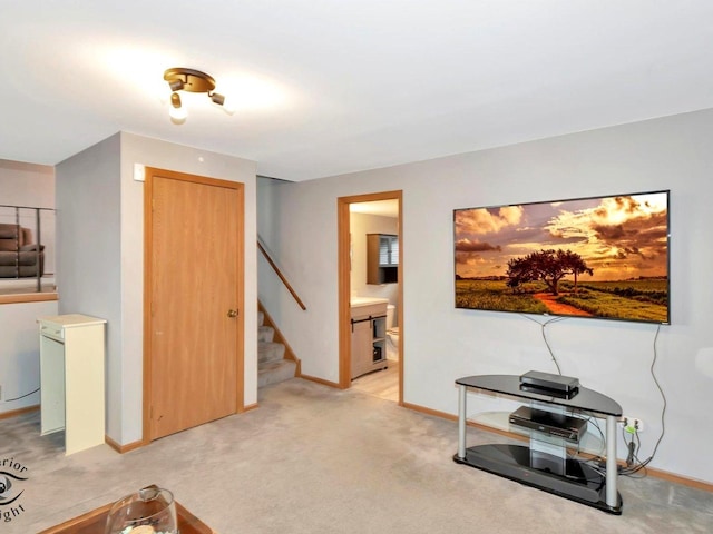 living room featuring light colored carpet