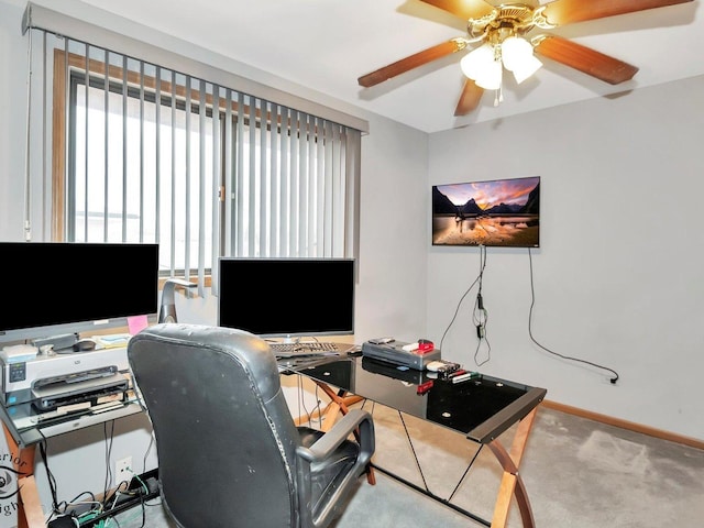 home office with ceiling fan and light colored carpet