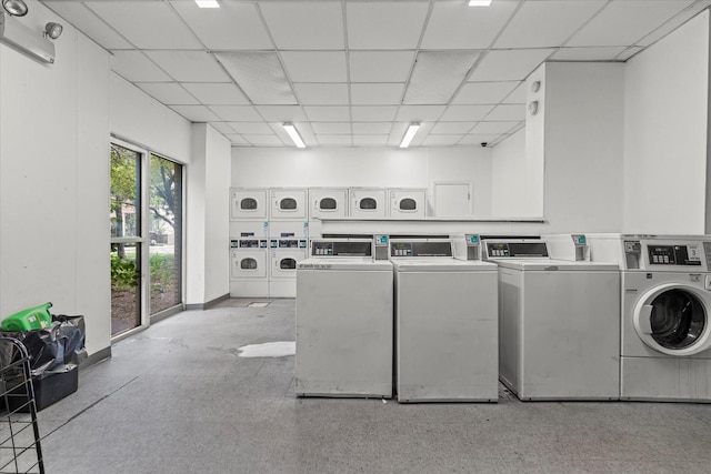 washroom featuring independent washer and dryer and stacked washer / drying machine