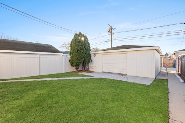 garage with a yard