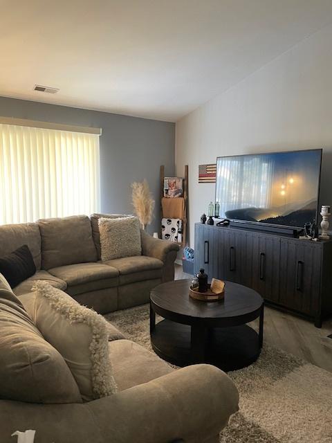 living room featuring light hardwood / wood-style floors