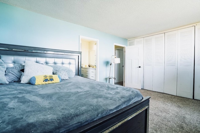 carpeted bedroom with a textured ceiling