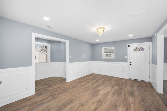 entrance foyer featuring dark hardwood / wood-style flooring