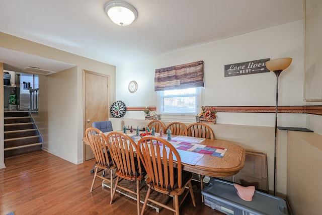 dining room featuring hardwood / wood-style flooring