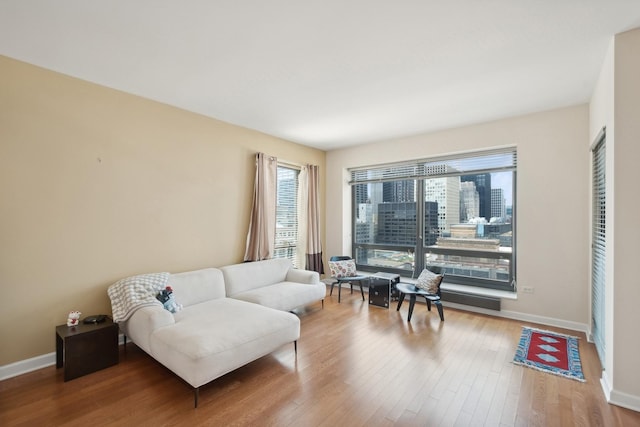 130 N Garland Ct Unit 2608, Chicago, IL 60602 - living area featuring plenty of natural light and wood finished floors