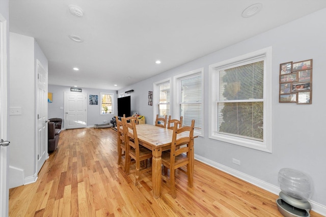 dining room featuring light hardwood / wood-style flooring