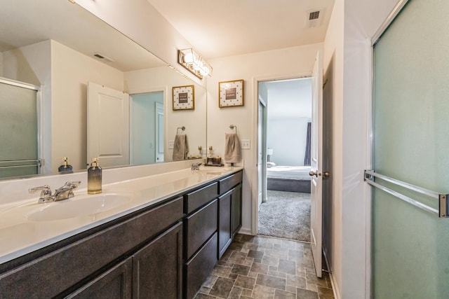 bathroom with vanity and walk in shower