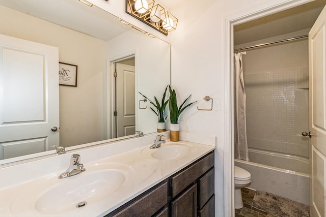 full bathroom featuring shower / tub combo with curtain, vanity, and toilet