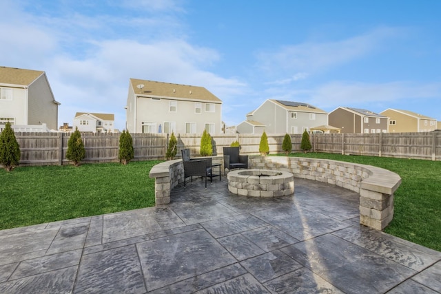 view of patio / terrace with a fire pit