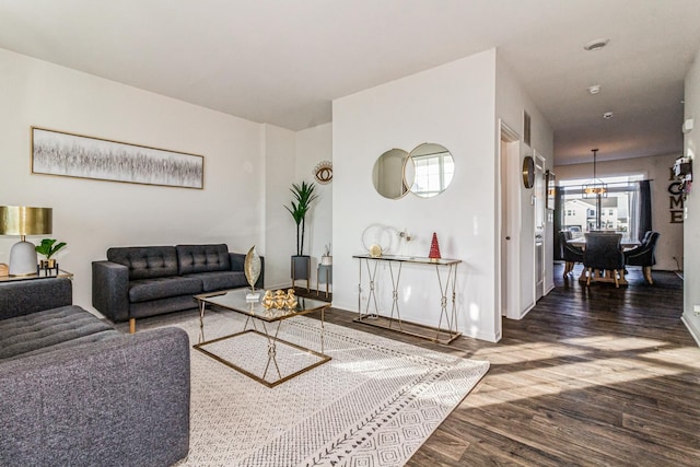 living room with dark hardwood / wood-style flooring