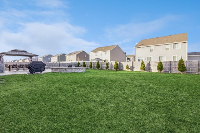 view of yard featuring a gazebo and a patio area