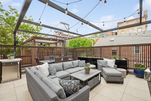 view of patio featuring an outdoor living space and a pergola