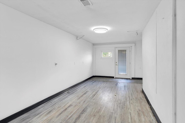 unfurnished room featuring light hardwood / wood-style flooring