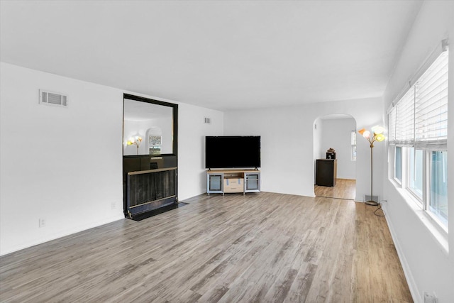 unfurnished living room featuring light hardwood / wood-style flooring