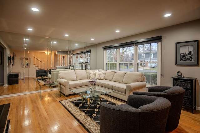 living room with light hardwood / wood-style flooring