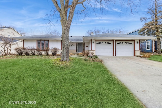 ranch-style house with a front yard and a garage