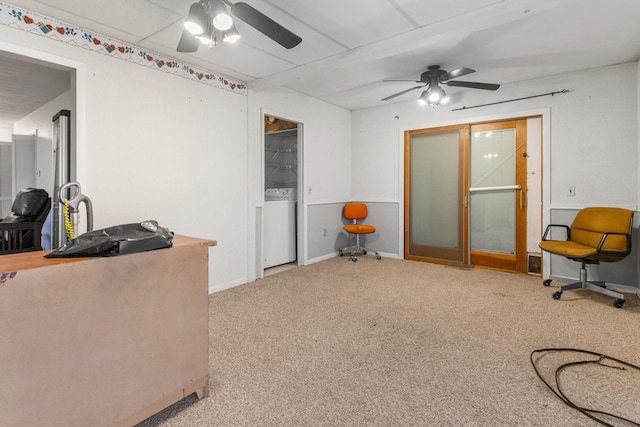 misc room with ceiling fan, light carpet, and washer / clothes dryer