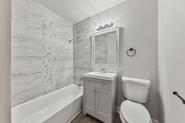 bathroom featuring vanity, wood-type flooring, and toilet