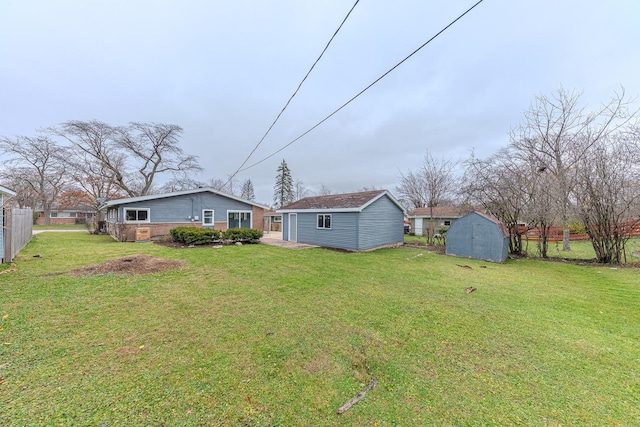 view of yard with a storage unit