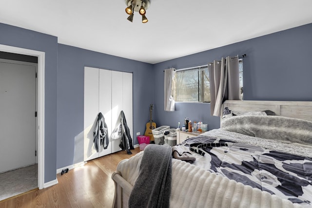 bedroom featuring light wood-type flooring