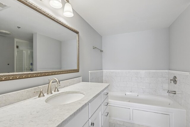 11110 Waters Edge Dr Unit 4D, Orland Park, IL 60467 - full bathroom with a garden tub, vanity, and a stall shower