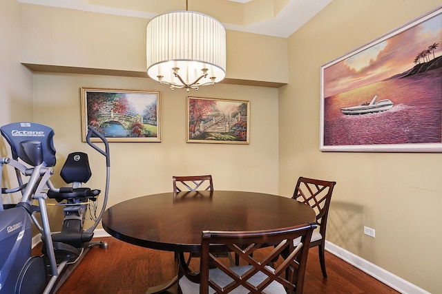 11110 Waters Edge Dr Unit 4D, Orland Park, IL 60467 - dining space with wood finished floors, baseboards, and a chandelier