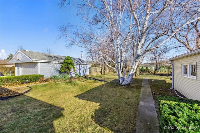 view of yard featuring a garage