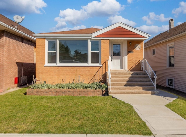 view of front facade featuring a front yard