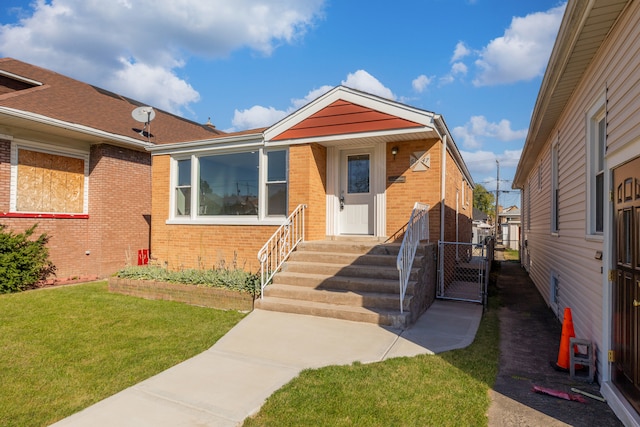 view of front facade featuring a front yard