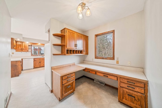 office space with sink and built in desk