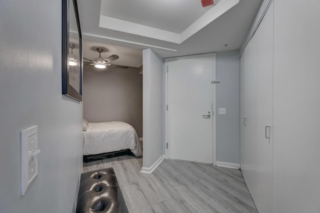 entryway featuring light hardwood / wood-style floors and ceiling fan